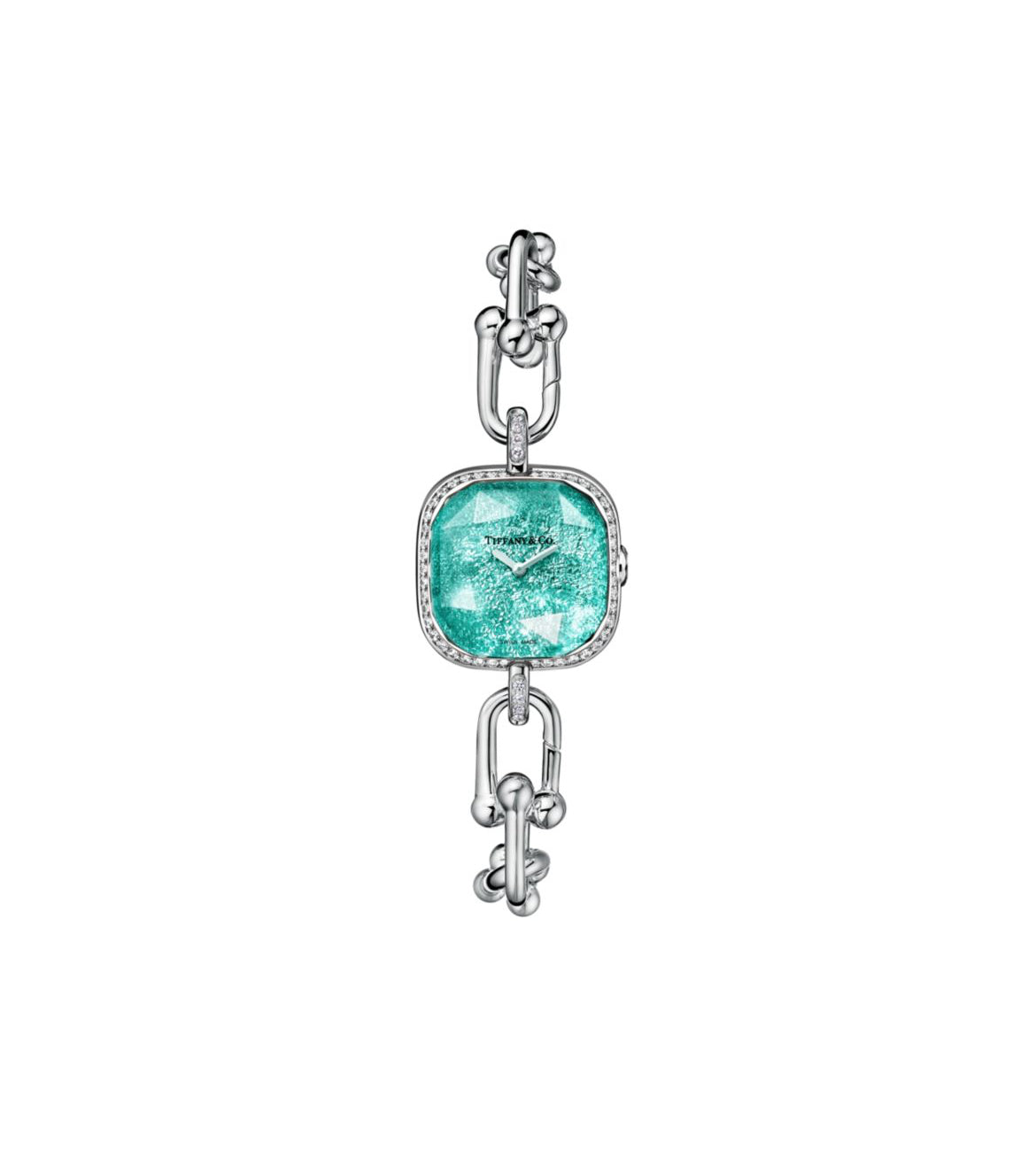 100% Real and diamond tested watch!! Sterling Silver and Steel with a Diamond Bezel. Great for summer, when the sun hits it, the beam shines as bright as the sun!